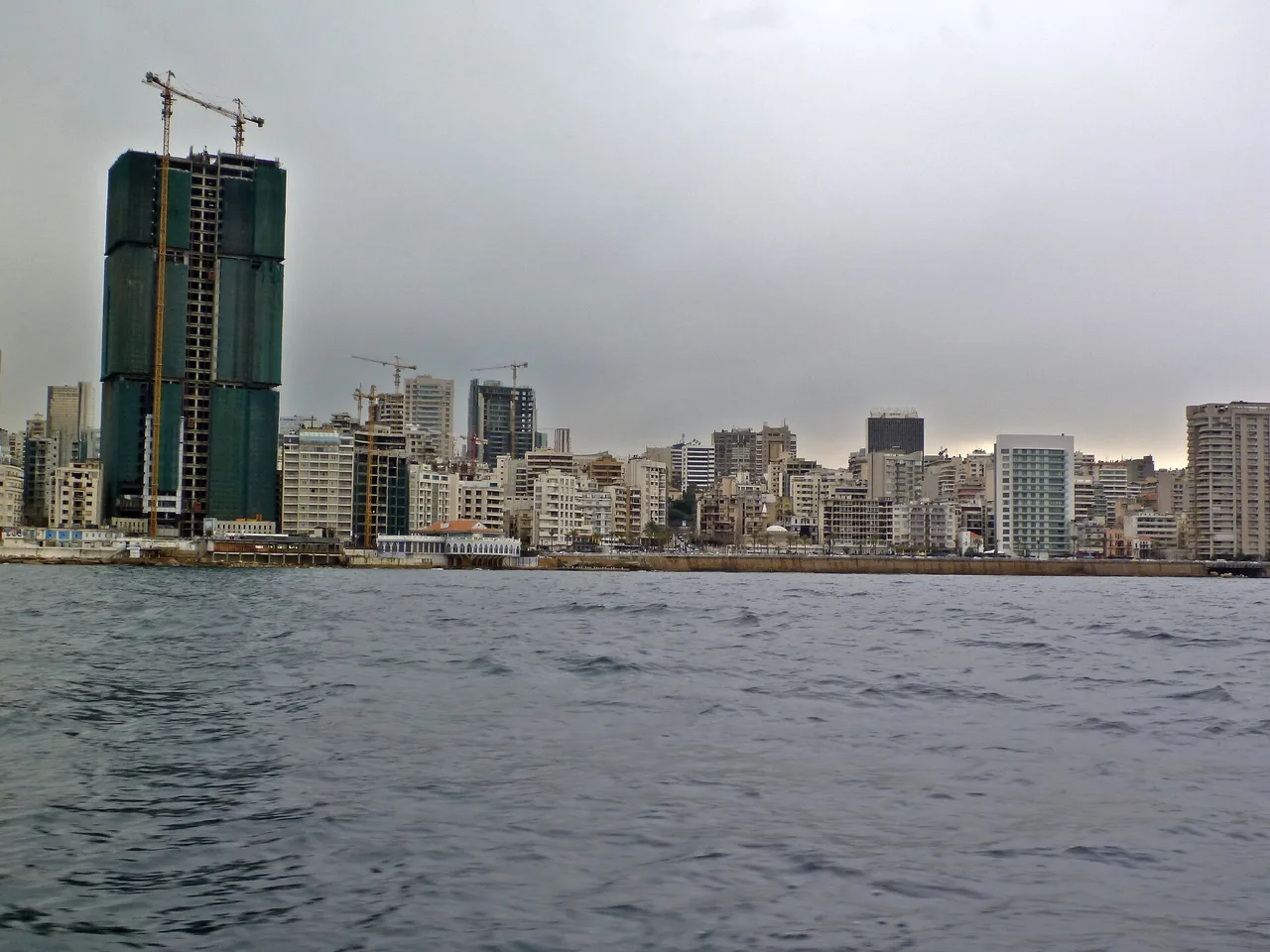 Beirut's corniche and skyline, seen from the sea (file photo). The killing in Lebanon's war is concentrated in the south, but the toll — more than 4,300 dead since March — is counted by the health ministry for the whole country.