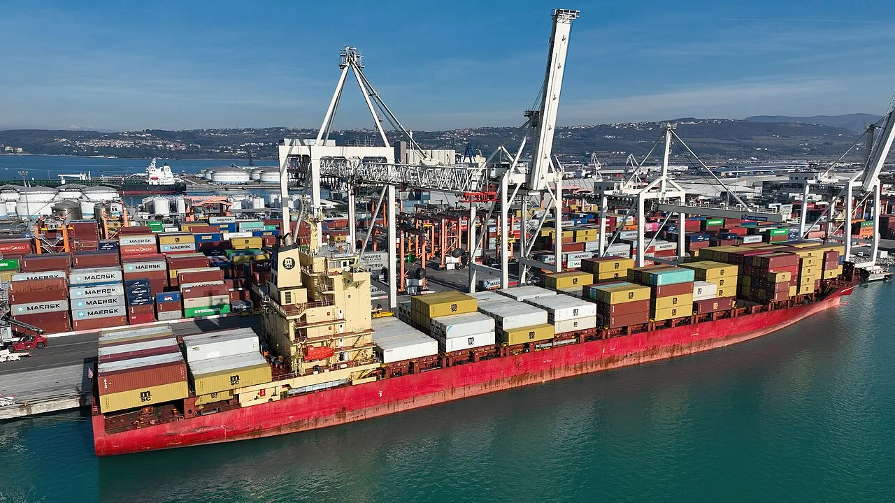 A container ship loaded with containers berthed under gantry cranes at a commercial port (file photo). The Contship Jet was carrying 421 containers from Haifa to Constanta when it was struck. This photo shows a different vessel at a different port and does not depict any event reported in this article.