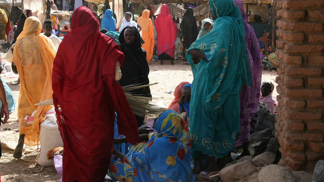 Women shoppers at a market in Darfur, Sudan (file photo, 2008). Monday's strike hit a busy market in Nyala, South Darfur. This photo does not depict any event reported in this article.