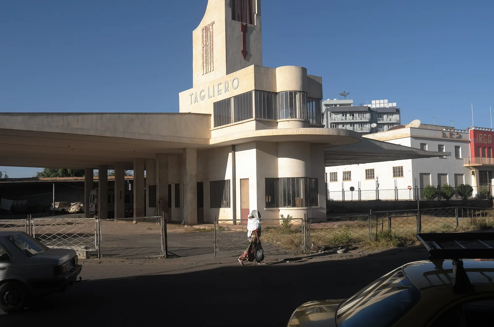 The Futurist-style Fiat Tagliero building (1938) in Asmara, Eritrea — an Italian-era modernist landmark. Generic file photo — it does not depict the events described in this article. — Image: Martin Schibbye / Wikimedia Commons (CC BY-SA 4.0)