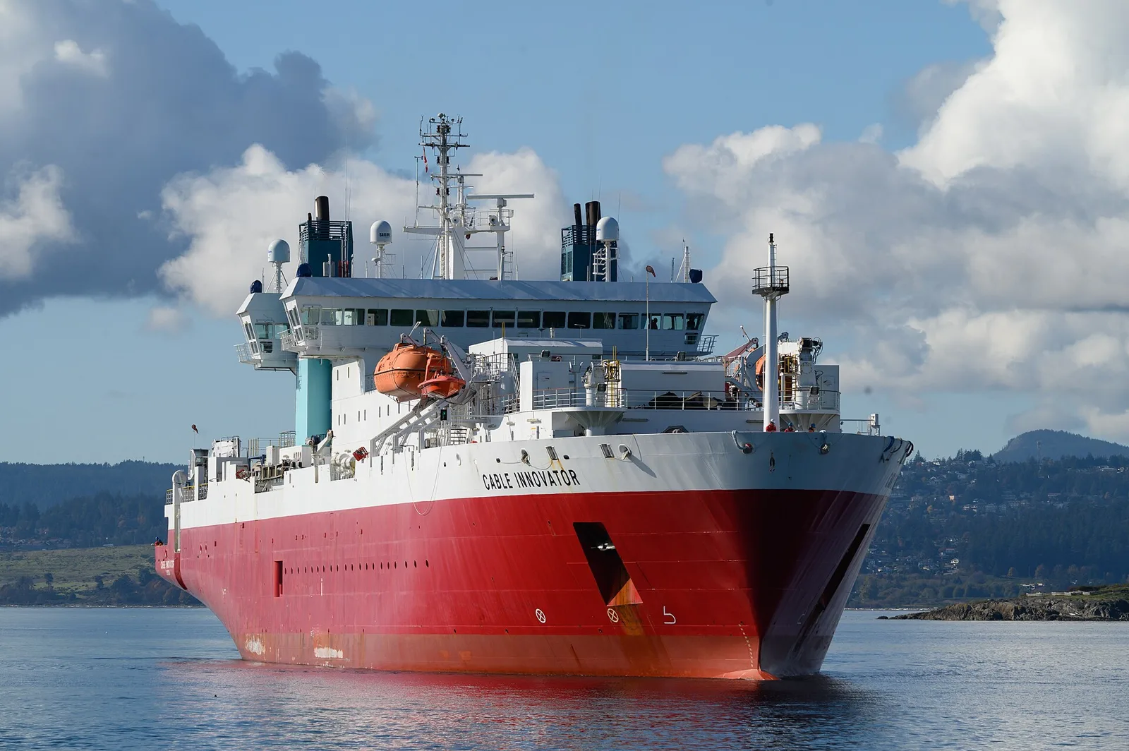 The cable-laying vessel Cable Innovator arriving at Victoria, British Columbia, Canada (file photo, 2024). Vessels of this type lay and repair the undersea fibre-optic cables that two Iranian officials told Reuters Tehran has planned to target if the war resumes. This photo does not depict any event reported in this article.