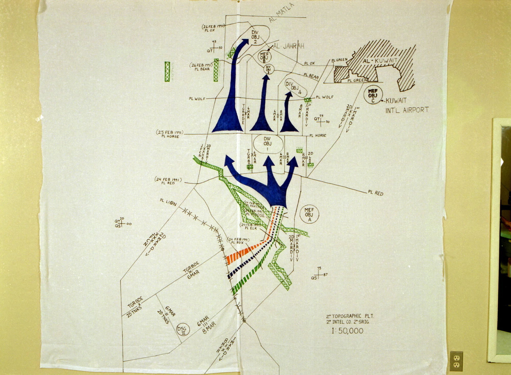 Hand-drawn U.S. Marine Corps tactical map of the 2nd Marine Division's assault plan on Kuwait City, February 24–26, 1991 — public domain, via Wikimedia Commons.