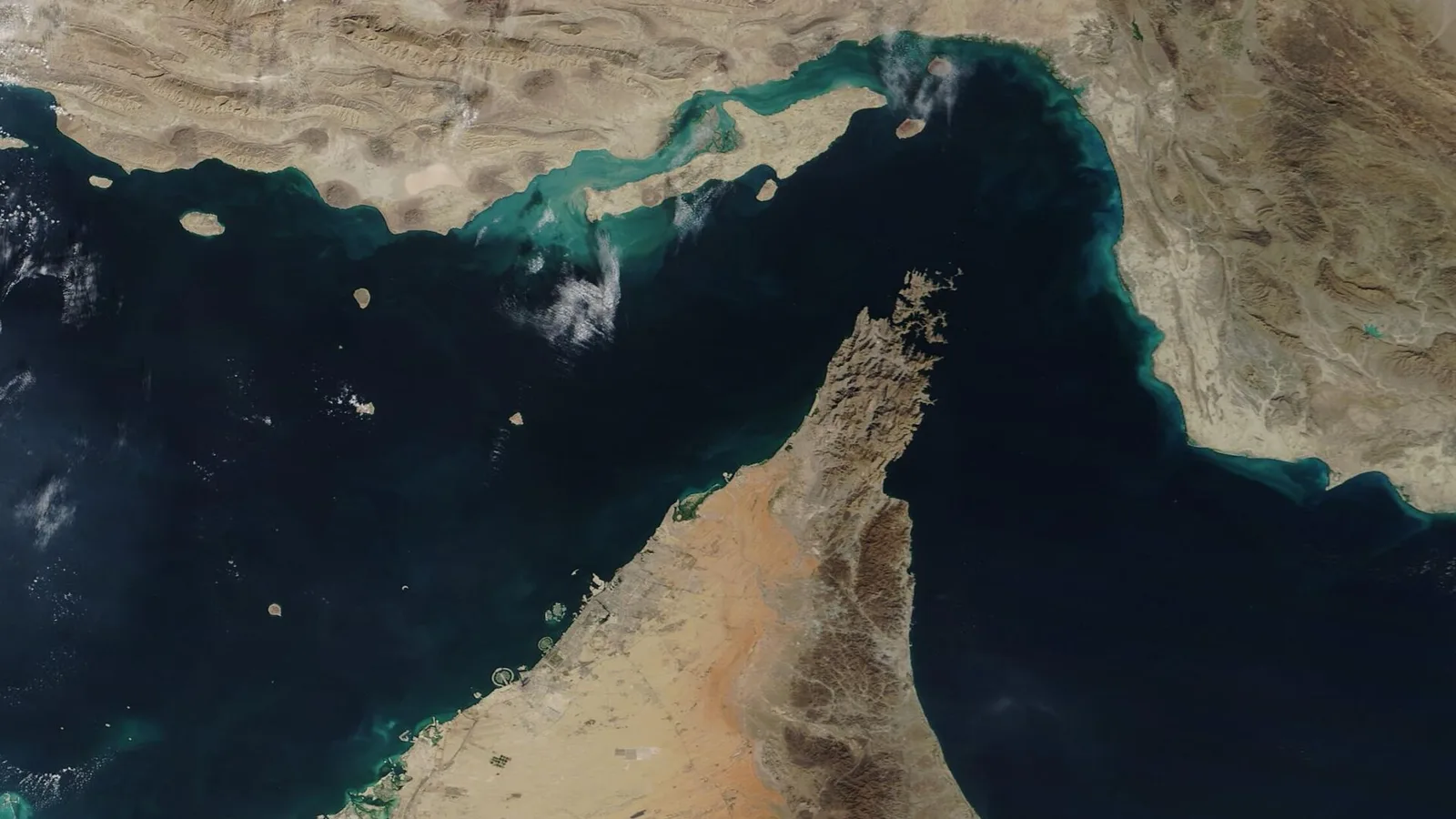 Satellite view of the Strait of Hormuz region (NASA MODIS, 2020). File image — it does not depict the current conflict described in this article.