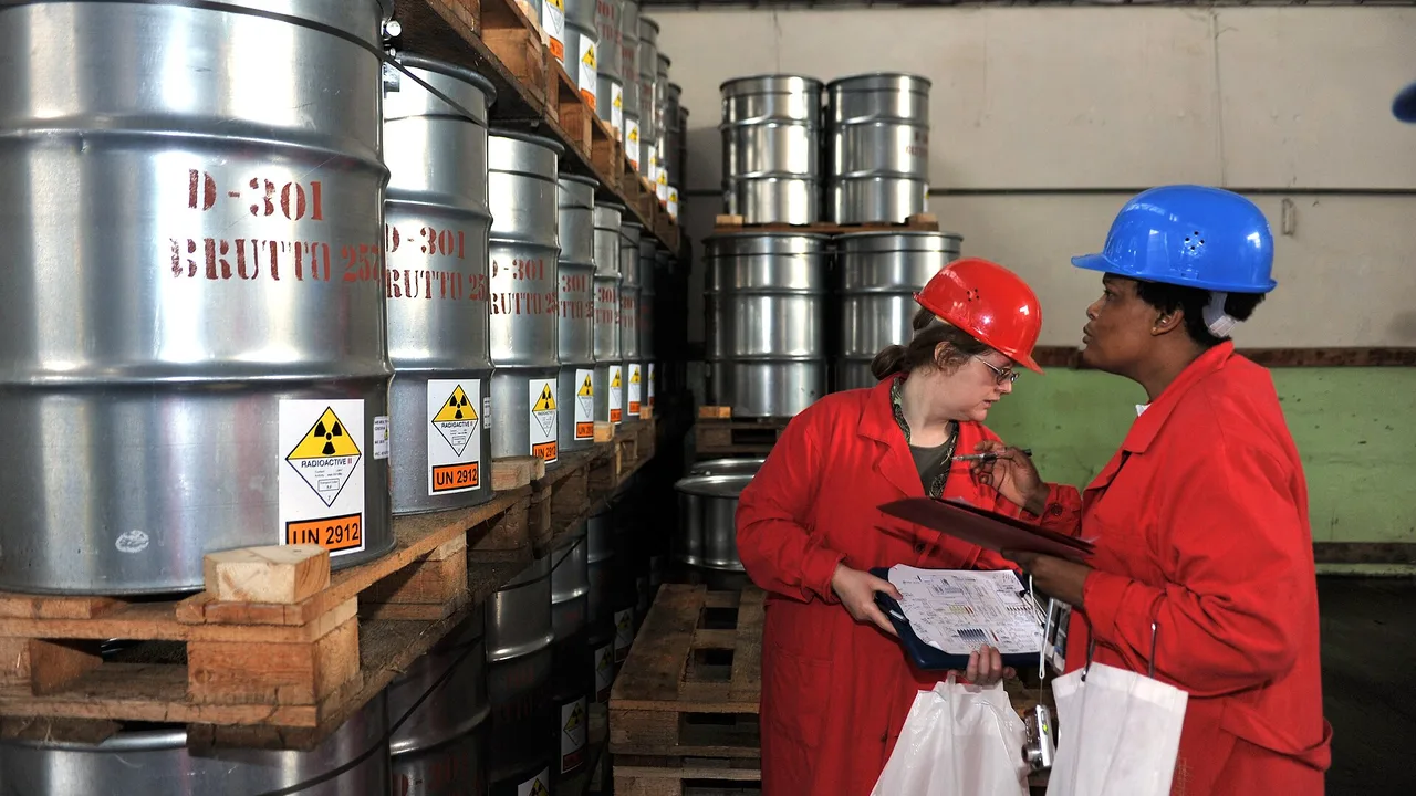 IAEA safeguards inspectors checking drums of nuclear material during a verification visit (file photo). The agency's inspectors were withdrawn from Iran in June 2025 and have not resumed normal inspections there. This photo does not depict any event reported in this article.