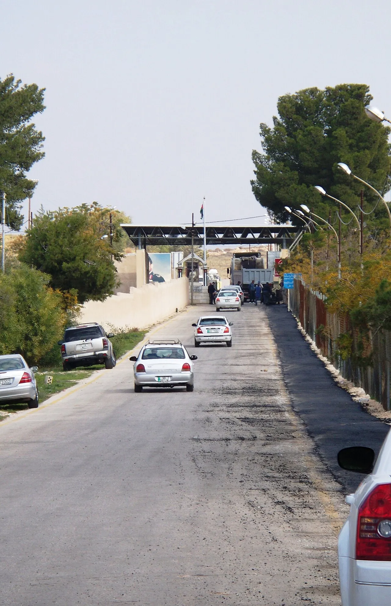 Cars approach a checkpoint on the Jordanian side of the Jordan–Syria border (file photo, 2009). Syria closed the Nassib crossing — Jaber on the Jordanian side — in both directions on Tuesday. This photo does not depict any event reported in this article.