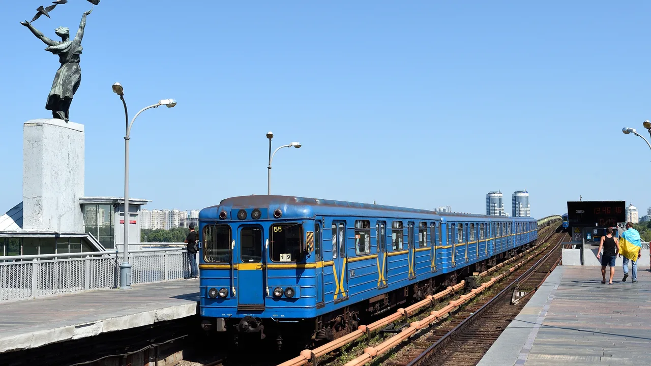 A blue Kyiv metro train at Dnipro station on the capital's Metro Bridge (file photo, 2019). This photo does not depict any event reported in this article.