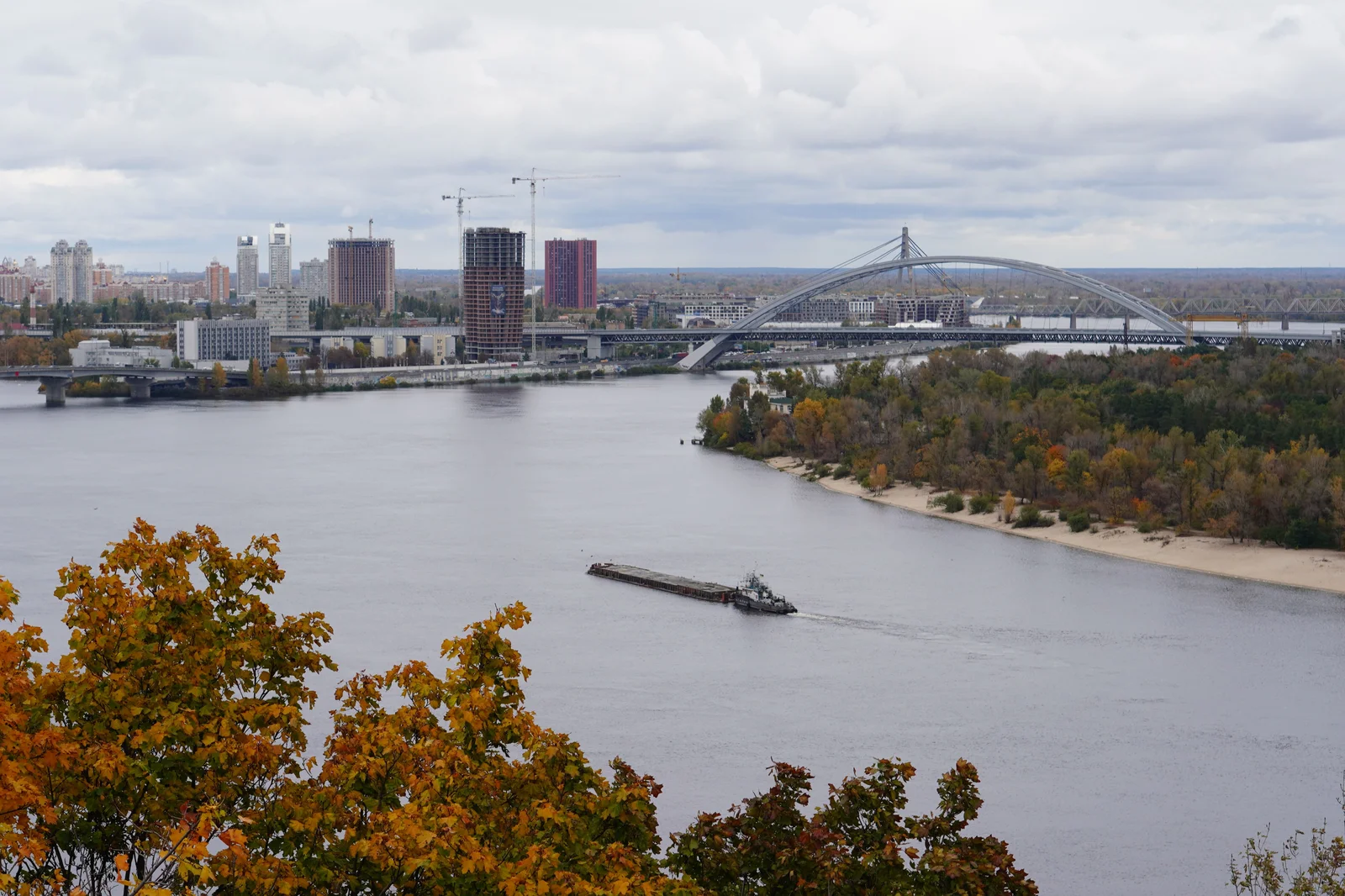 A bridge over the Dnipro River in Kyiv with the city skyline beyond. File photo — it does not depict the strike or the events described in this article.