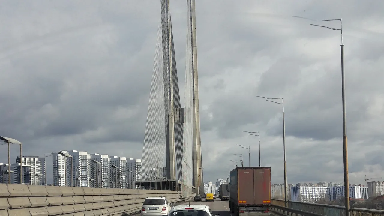 Kyiv's Southern (Pivdennyi) Bridge over the Dnipro River, photographed from the roadway (file photo). The bridge carries both road traffic and a Kyiv metro line. This photo does not depict any event reported in this article.