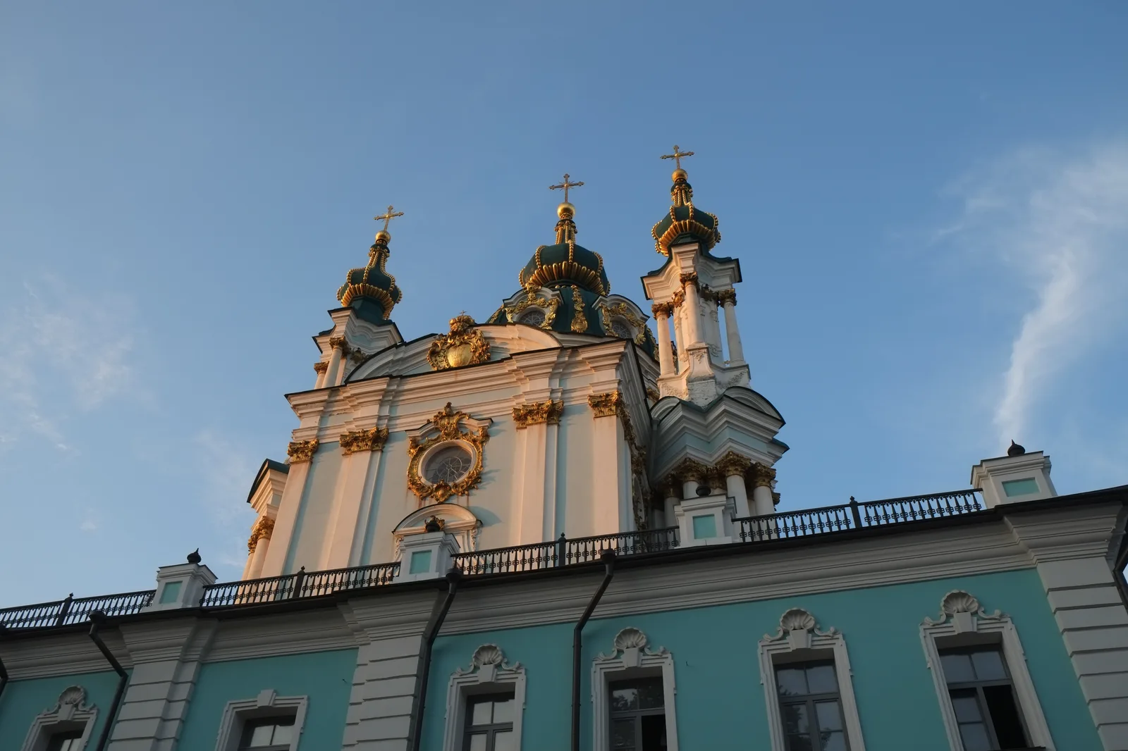 The domes of St Andrew's Church in Kyiv against an evening sky (file photo). President Zelenskyy said a monastery was among the sites damaged overnight; this photo does not depict that site or any event reported in this article.