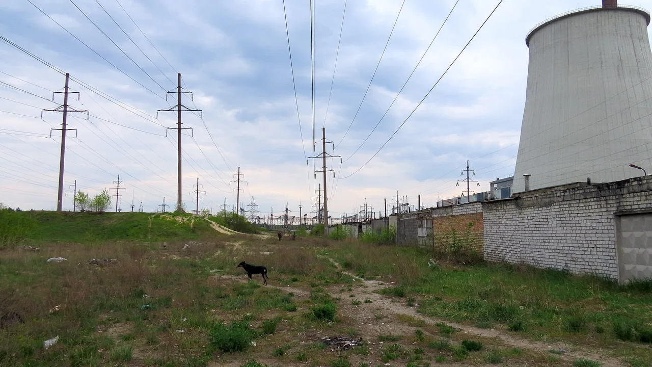 Power lines and a cooling tower at a thermal plant in Kyiv (file photo). Both sides have struck each other's energy systems throughout the war; what would count as a violation of the current announcement has never been defined in public. This photo does not depict any event reported in this article.