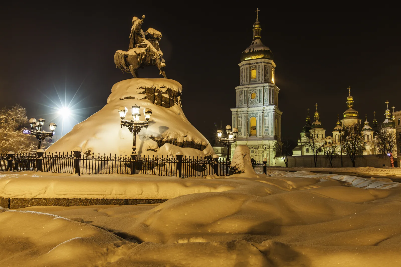 Snow covers Sofiiska Square in Kyiv in winter, with the Bohdan Khmelnytsky monument and St Sophia's bell tower (file photo). This photo does not depict any event reported in this article.