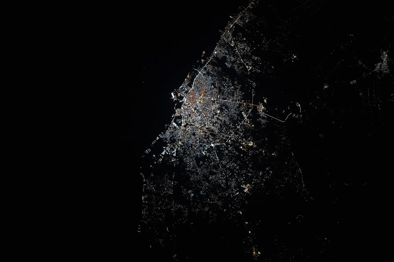 Night view of Benghazi, Libya, photographed from the International Space Station. Generic photo; it does not depict any trial, prison, or execution.