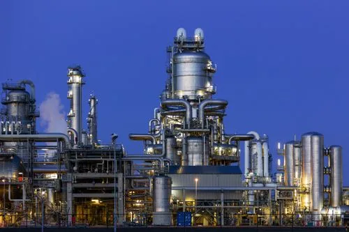 An oil refinery at twilight (file photo). Ukraine's long-range drone campaign has targeted Russian refineries and fuel infrastructure; this photo does not depict any reported strike.