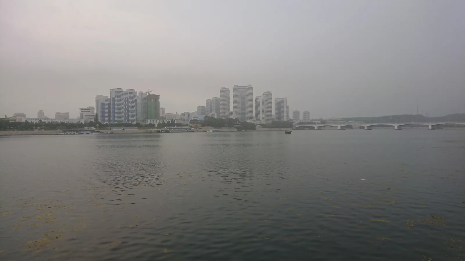 Pyongyang's skyline across the Taedong River.