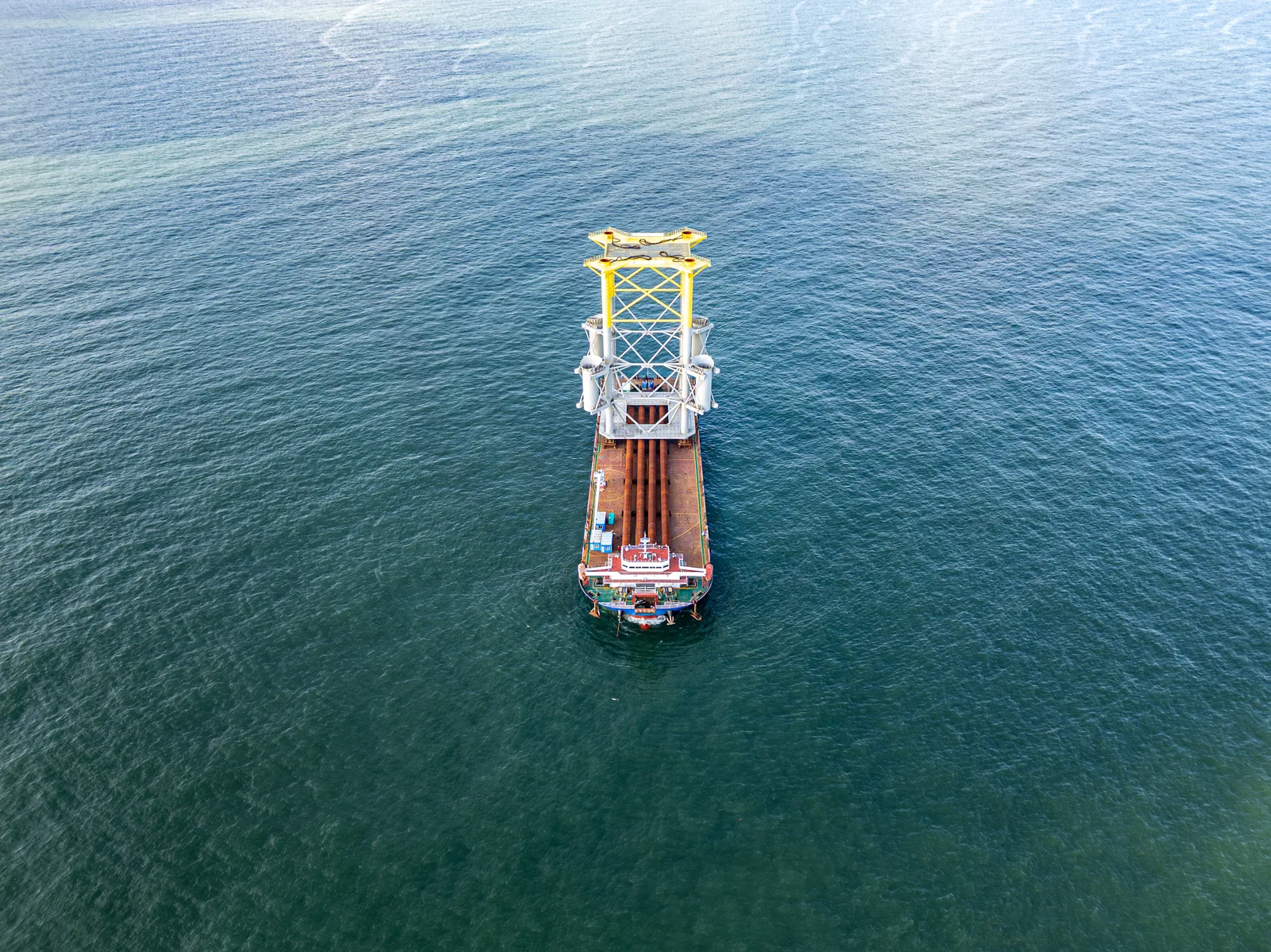 An offshore installation vessel on the South China Sea, seen from above.