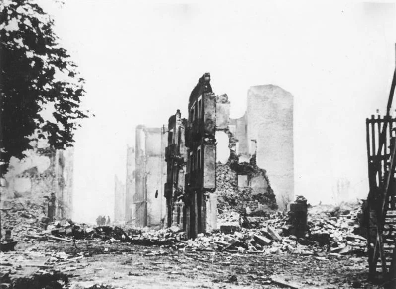 A rubble-strewn street in Guernica in 1937, after the town was bombed on 26 April by German and Italian aircraft flying for Franco's Nationalists — the raid that made aerial terror bombing a global shock.