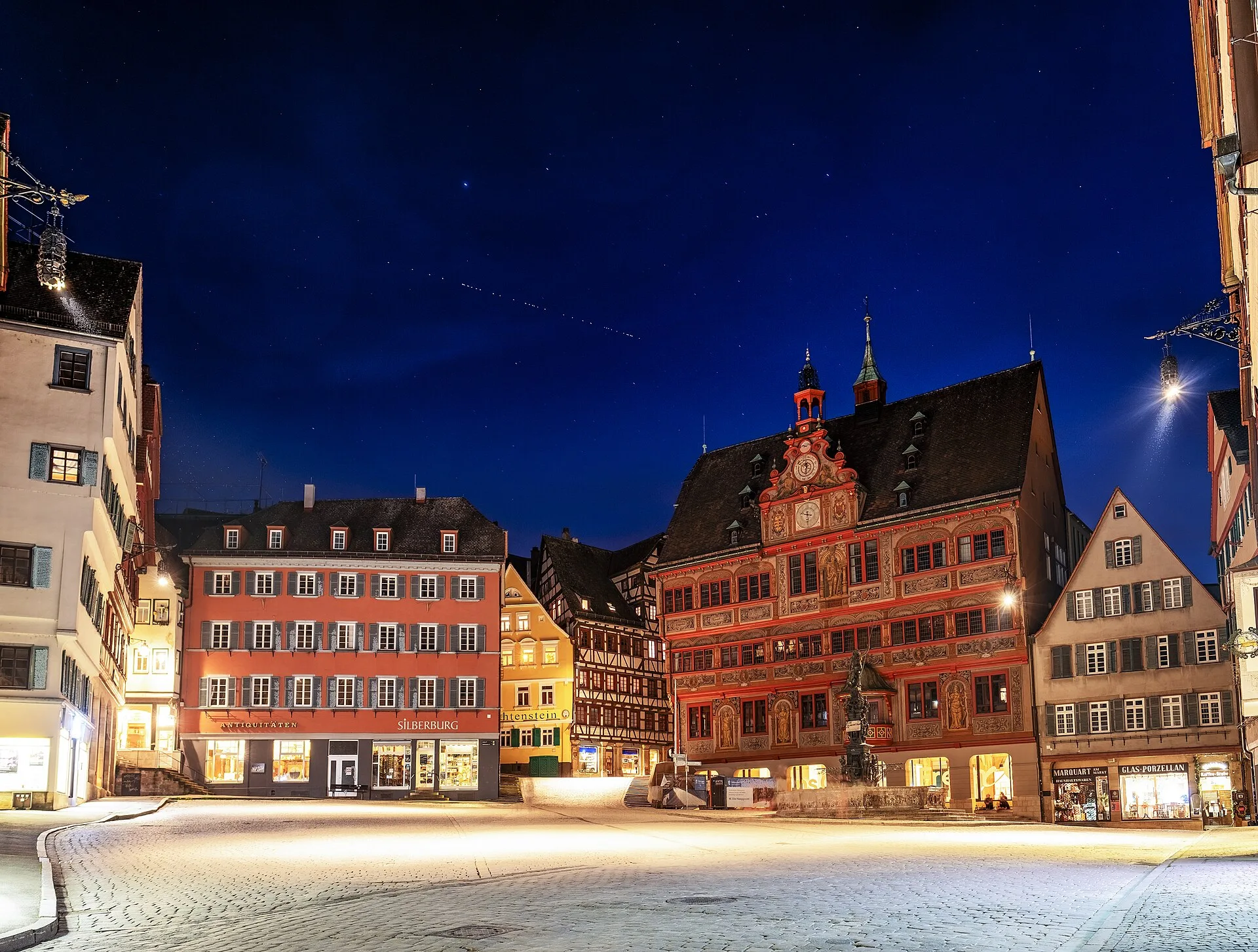 A train of Starlink satellites passes over the town hall in Tübingen, Germany, at night (file photo). This photo does not depict any terminal, unit or event reported in this article.