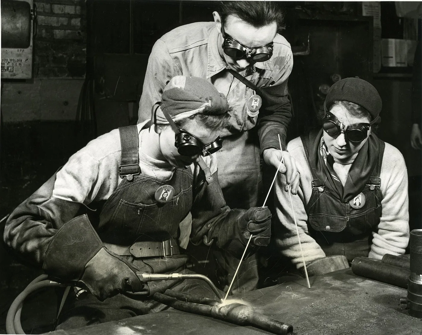 Workers at a steel tubing plant in the 1940s. Archive photo — it does not depict the Ukrainian steel plants described in this article.