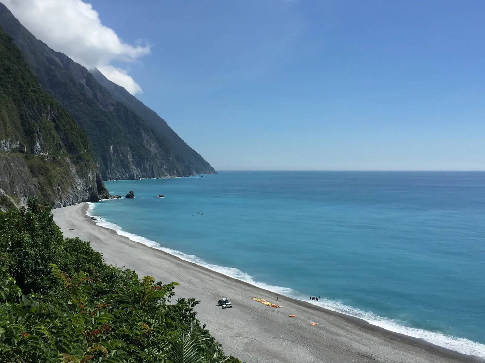 Taiwan's east coast: green cliffs beside turquoise water.