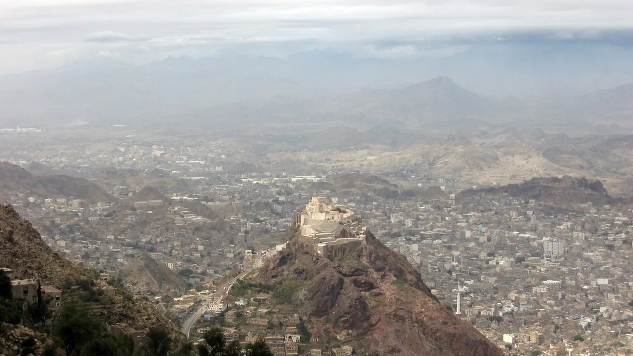 Al-Qahira Castle on its hill above Taiz, with the city spread out below (file photo). Government-backed forces control the city centre while Houthi forces hold the surrounding heights and roads, Human Rights Watch said. This photo does not depict any event reported in this article.