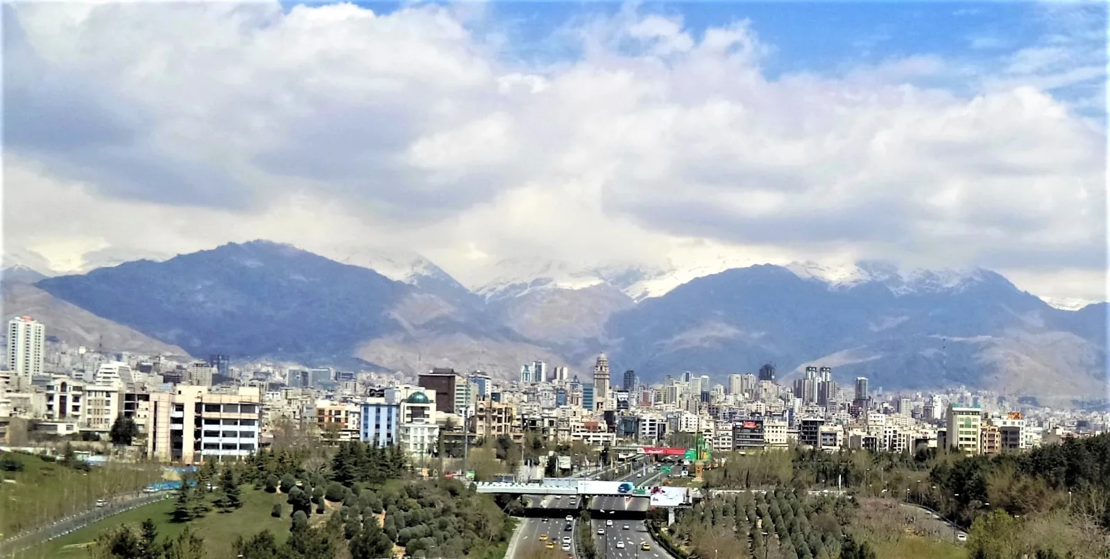 Tehran and the Alborz mountains (file photo). Iran's foreign minister said Tehran's offer to broker talks between Saudi Arabia and the Houthis has received no response from either side. This photo does not depict any event reported in this article.