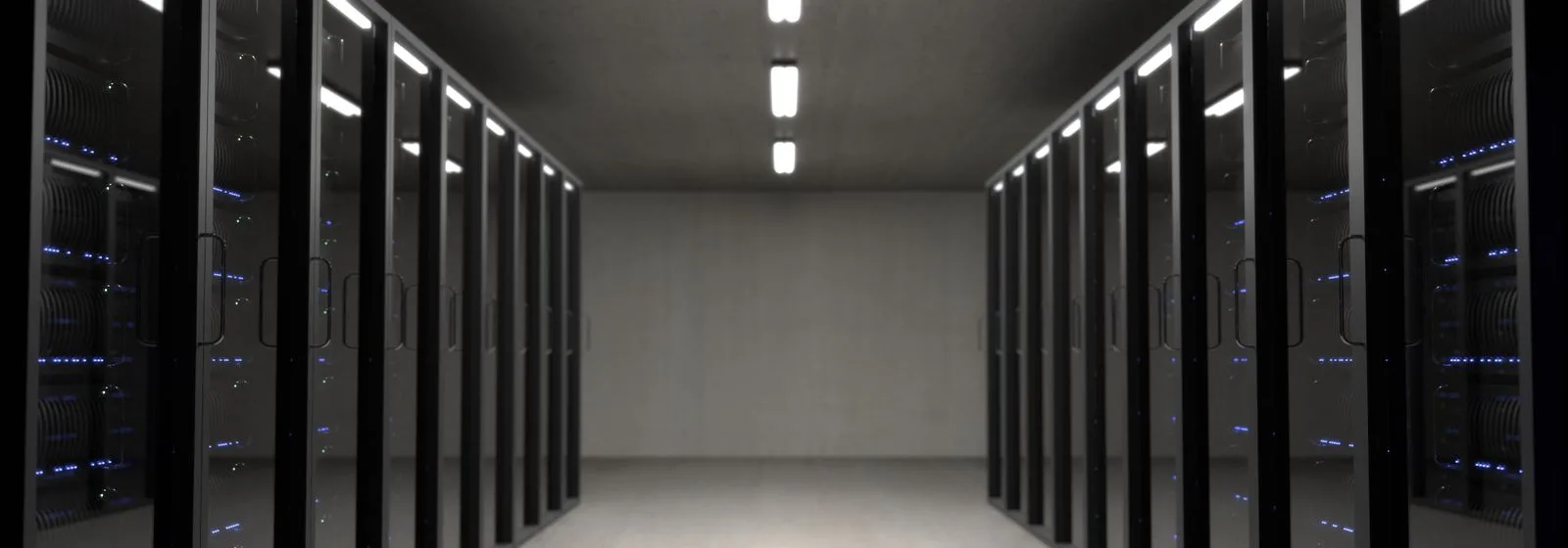Rows of server racks inside a data centre.