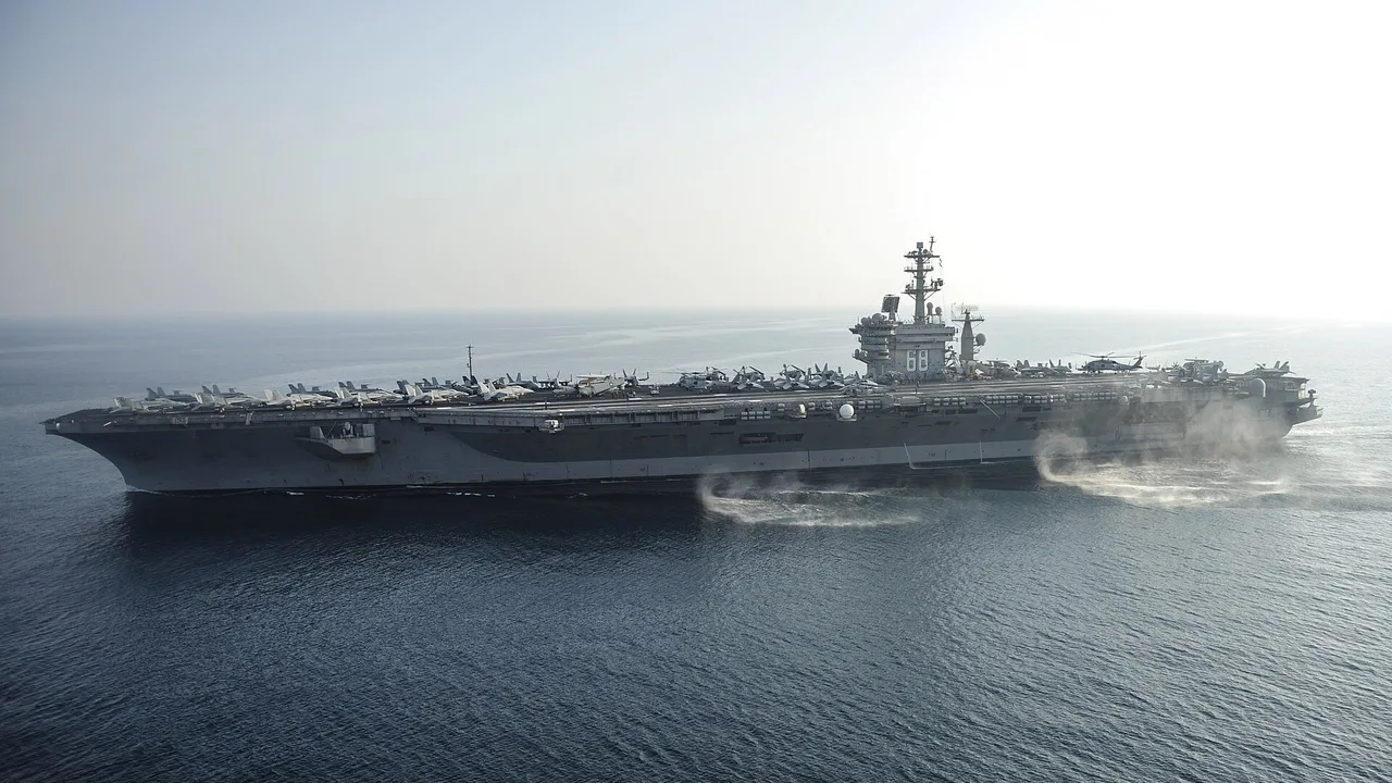 The aircraft carrier USS Nimitz transiting the Persian Gulf (file photo, August 2013). Carrier operations in the Gulf are among the running costs included in the Pentagon figures. This photo does not depict any event reported in this article.