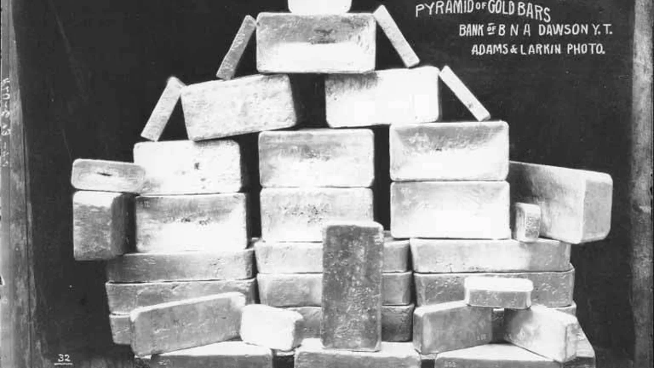 Gold bars stacked in a pyramid at Dawson, in a photograph taken between about 1902 and 1910. File photo — it does not depict any vault or event described in this article.