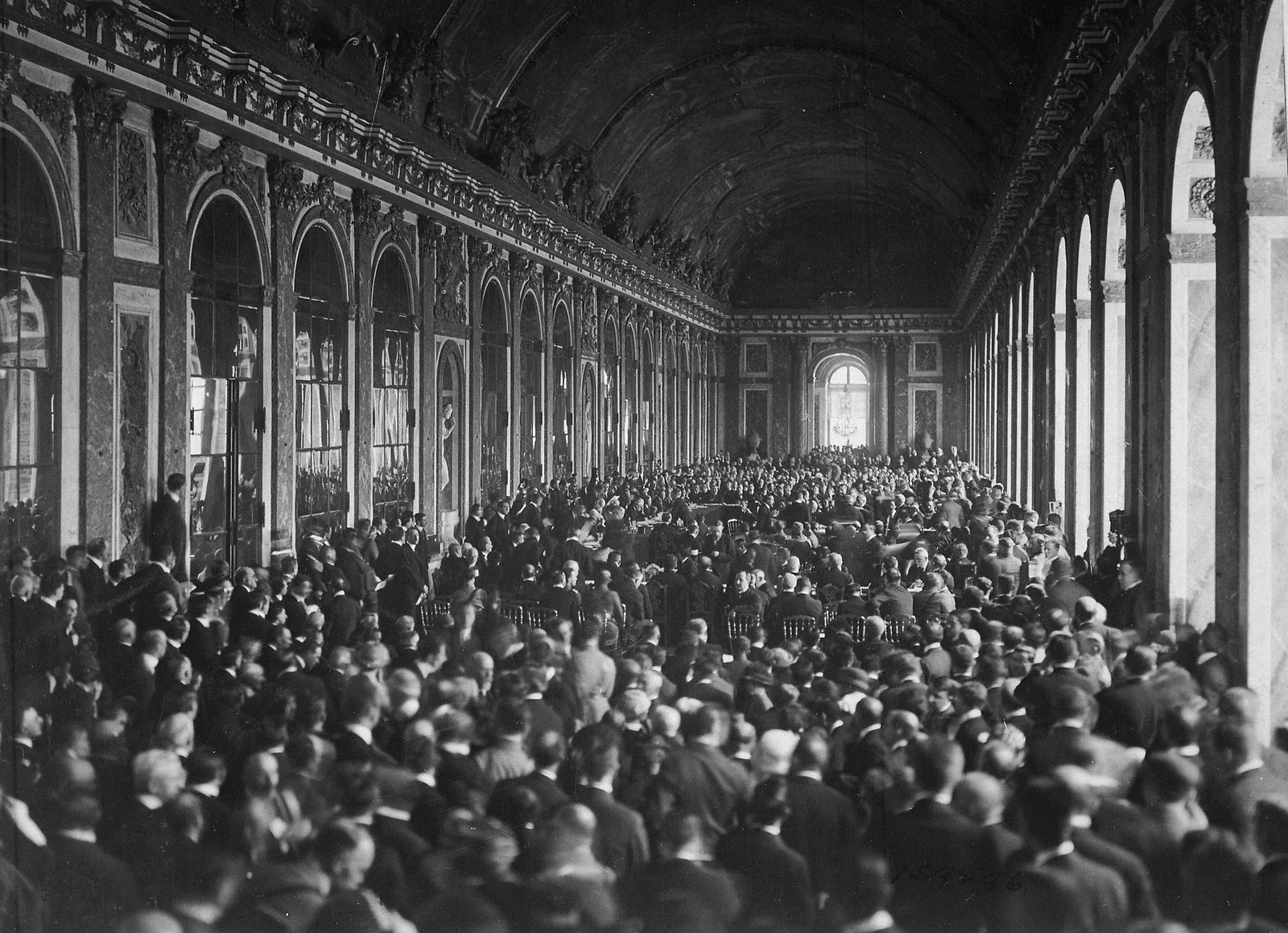 Dignitaries in the Hall of Mirrors, Palace of Versailles, at the signing of the Treaty of Versailles, June 1919.
