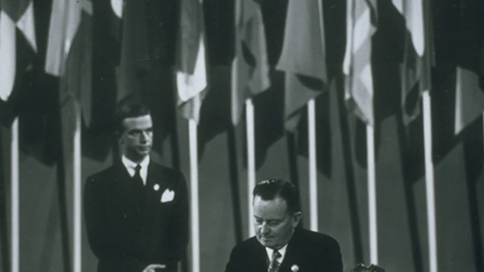 Frank Forde signing the United Nations Charter for Australia at the San Francisco Conference, 1945. - Photo: Australian Government, Department of Information (public domain)
